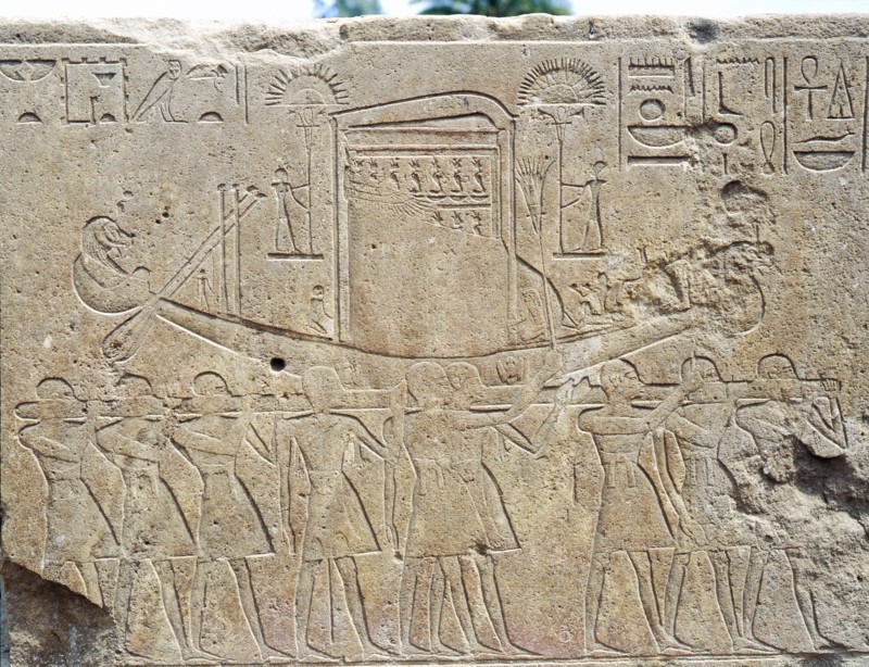 Priests carry the sacred boat with Amuns tabernacle