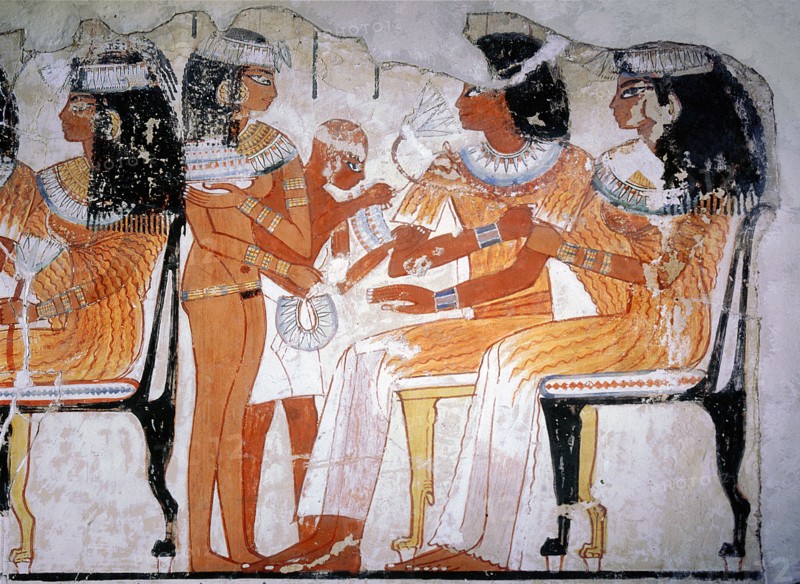 A detail of a wall painting from the tomb of Nebamun depicting two guests at a banquet
