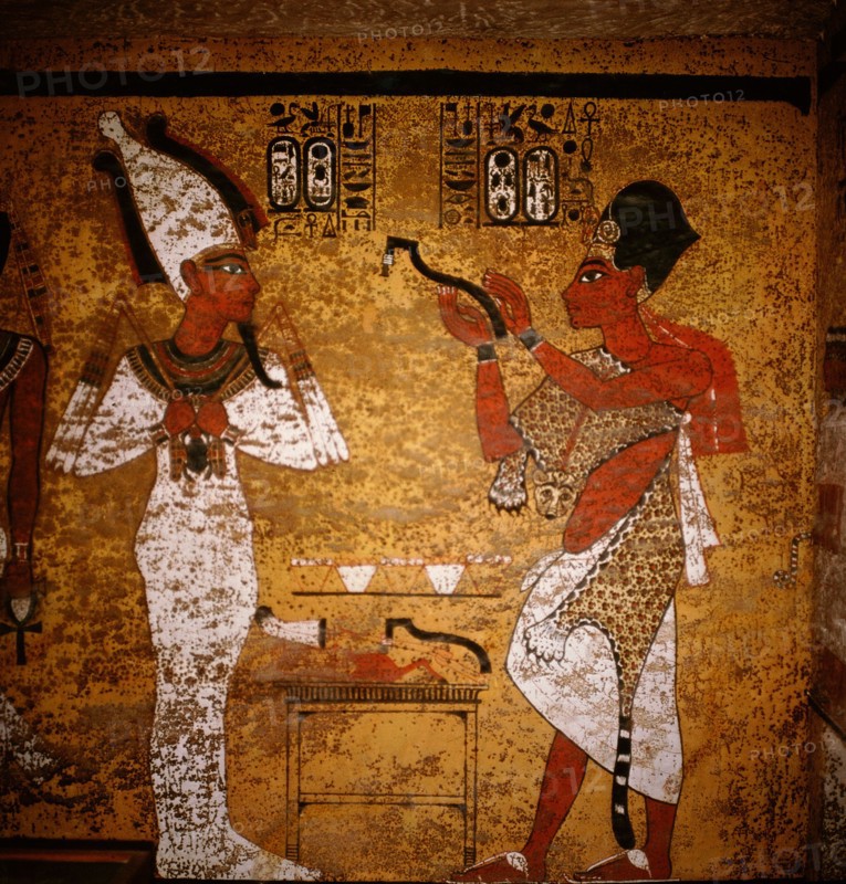Wall painting from the tomb of Tutankhamun showing King Aye performing the mouth opening ritual on the mummy of Tutankhamun