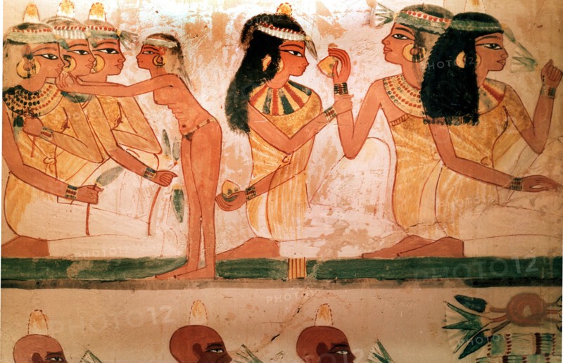 A detail of a painting from the tomb of Nakht depicting three ladies at a feast