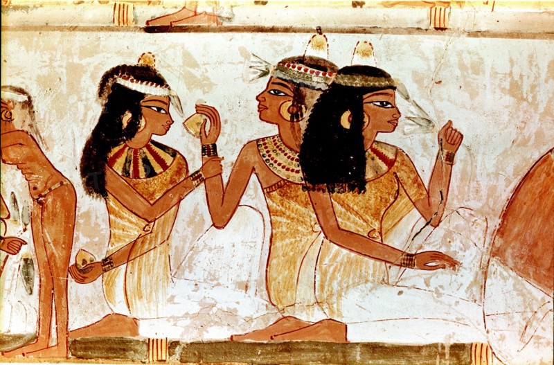 A detail of a painting from the tomb of Nakht depicting three ladies at a feast