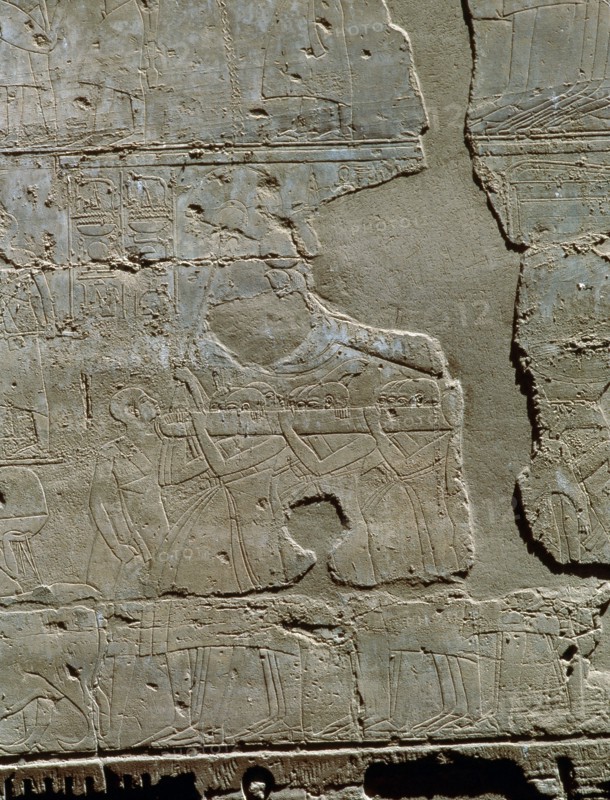 Fragmentary relief showing porters carrying a solar barque