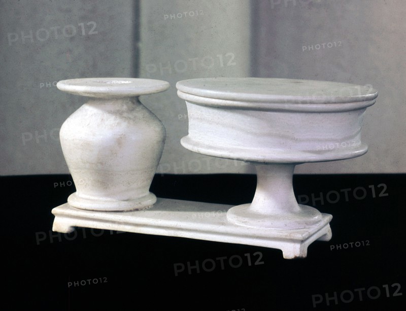 A double kohl tube for cosmetics and ointments, carved out of a single piece of alabaster