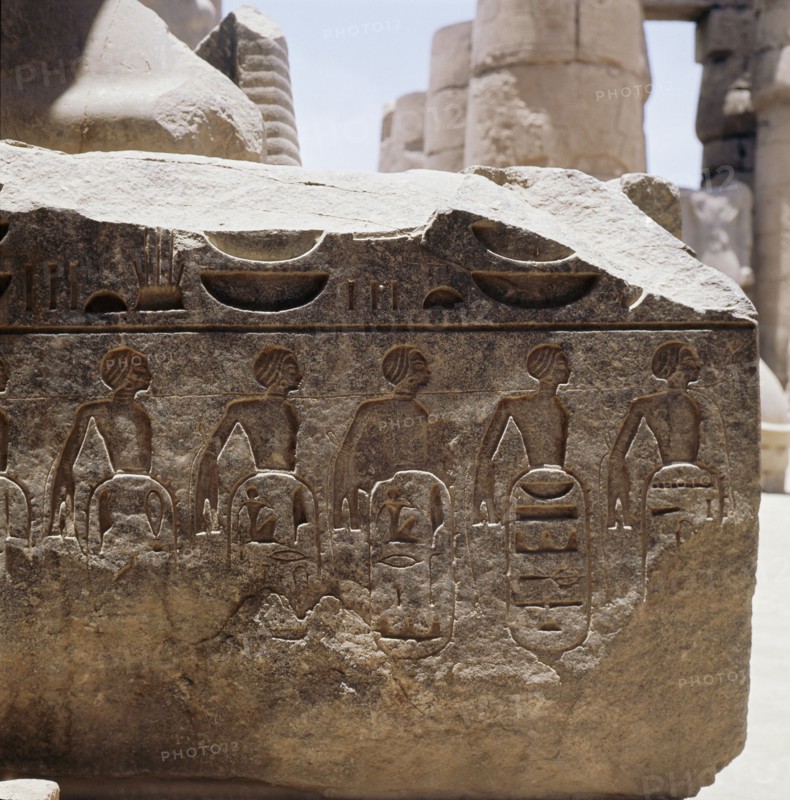 Relief decoration showing foreign, possibly Nubian, captives with their hands bound behind their backs and a rope around their necks