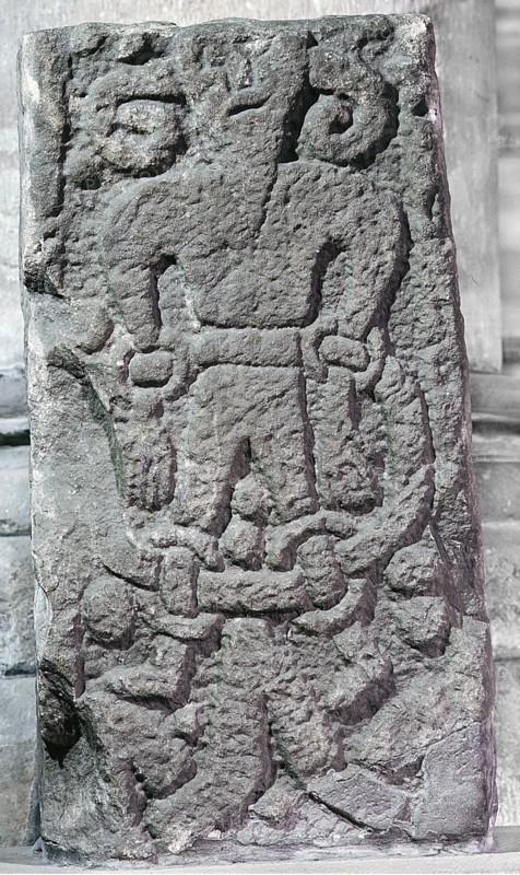 The Bound Devil on a cross at Kirkby Stephen, Cumbria