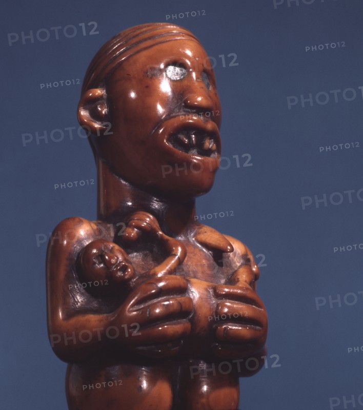 Ivory staff or sceptre finial, a prestige carving for royal or chiefly use, depicting a matrilineal ancestor