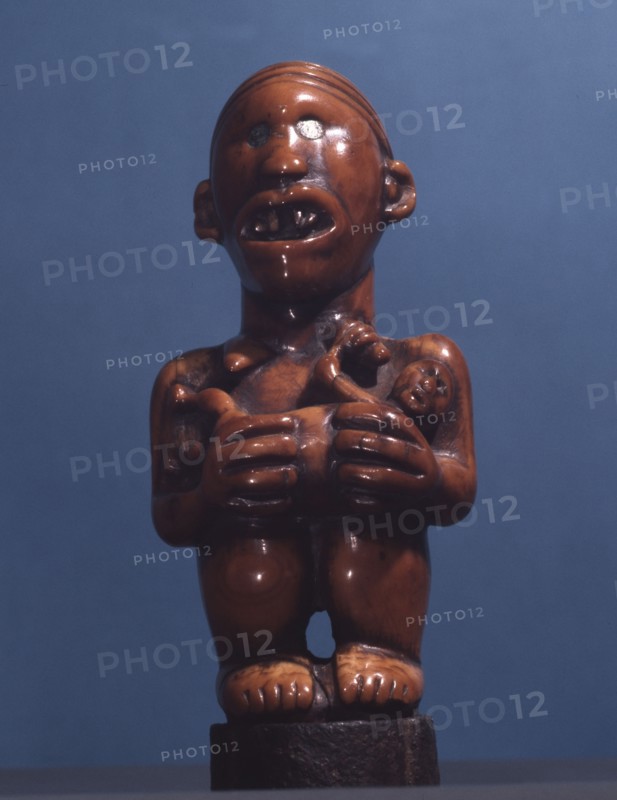 Ivory staff or sceptre finial, a prestige carving for royal or chiefly use, depicting a matrilineal ancestor