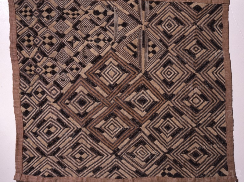 These raffia dance skirts were woven in pieces by men using upright single heddle looms, then sewn together and embroidered using a cut pile technique by women