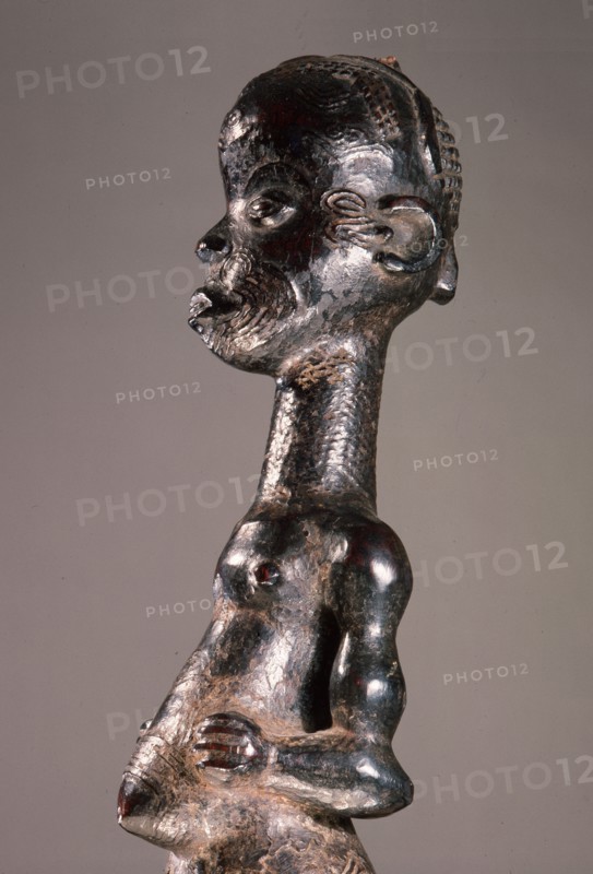 A standing figure with scarification design which was used in the Chibola cult