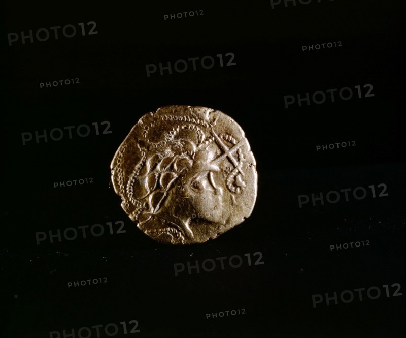 Coin showing a head surrounded by Ss, a favorite motif of the Armorican people
