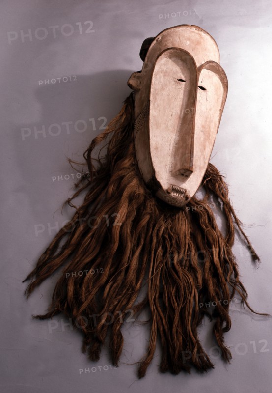 Masks with elongated white faces of this type were used by men of the Fang judiciary association known as Ngil