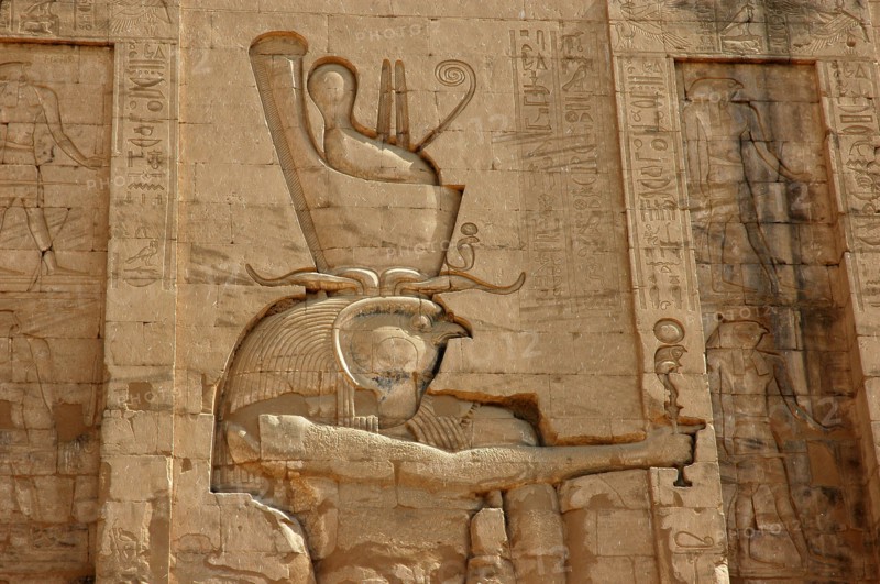 Outer wall of the Pylon relief depicting Horus the Elder wearing the crowns of upper and lower Egypt