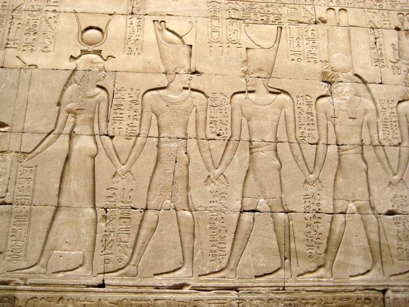 Reliefs on the outer back walls of the temple complex depicting a procession of gods and goddesses holding hands