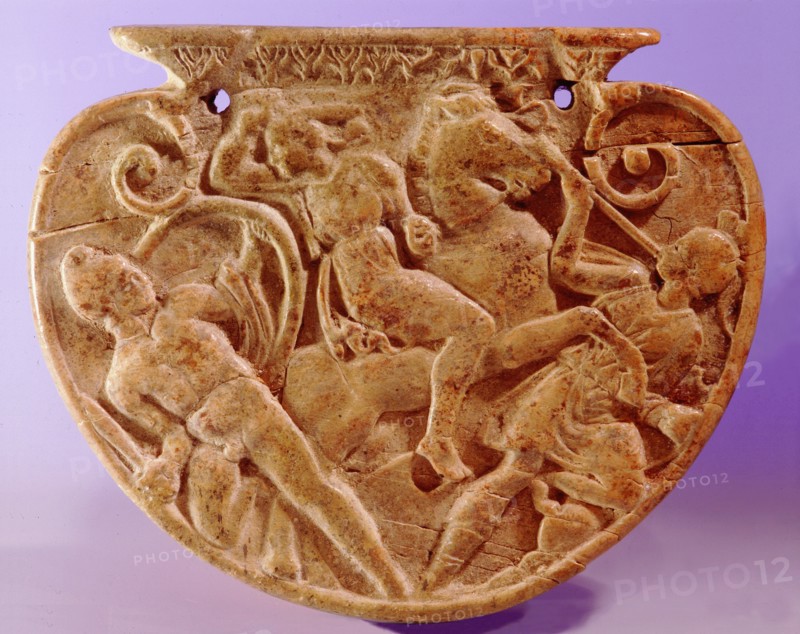 Hellenistic ivory sword chape (the end of a scabbard) showing a battle between Greeks and Amazons