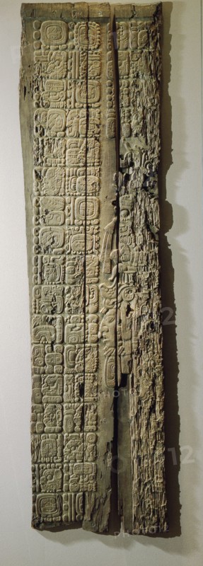 Glyphs on a carved wood lintel from Temple IV at Tikal, collected in 1877 by the explorer Gustav Bernoulli