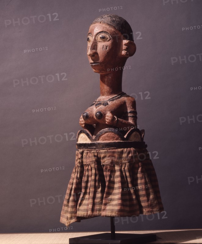 A figure probably from an altar which promotes the fertility ofwomen and crops