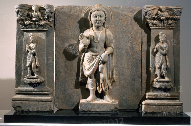 Frieze with depiction of the Reassuring Maitreya flanked by two donors
