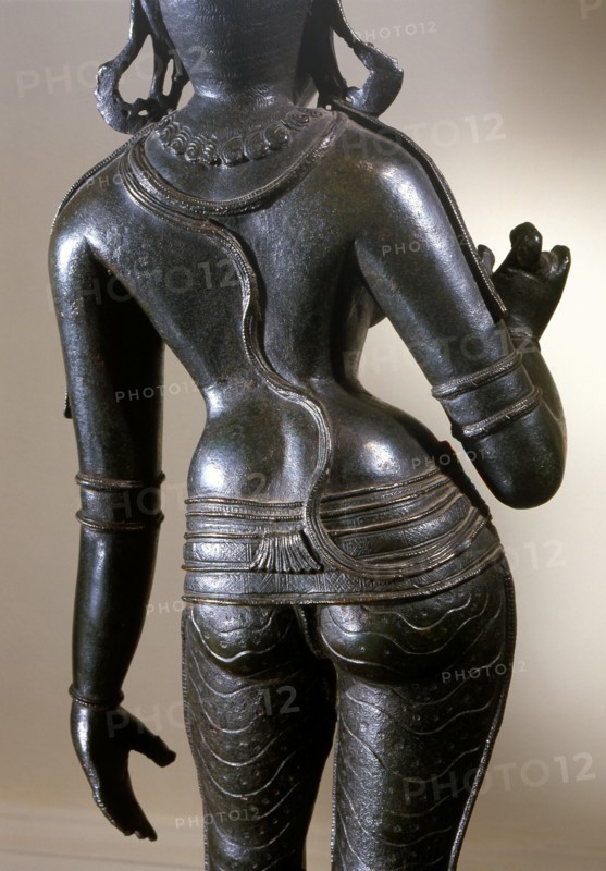 Statue of Parvati identified by the tall conical crown (katakamundra), reincarnation of Sati and consort of Shiva