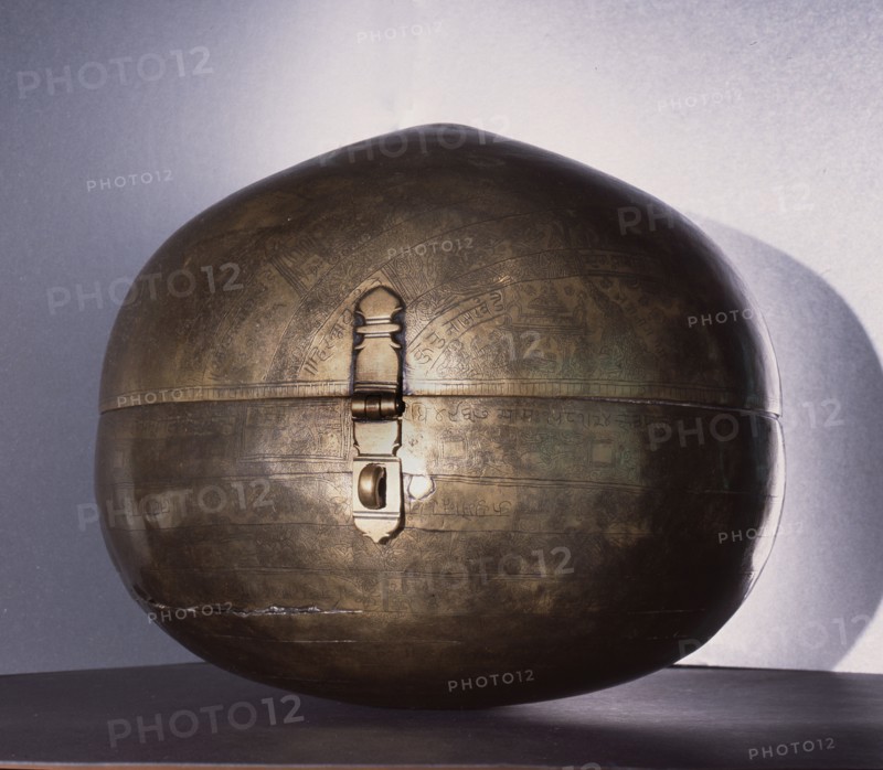 Metalware spherical storage box known as Bhugola or Earth Ball engraved with a representation of the earth as known in Hindu cosmology