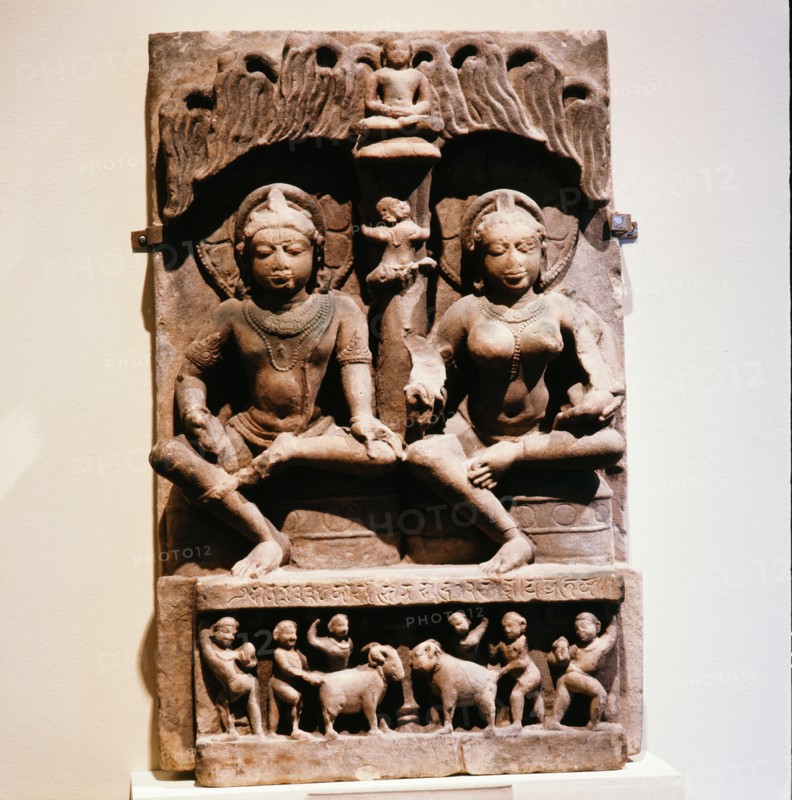 A stele with two seated figures