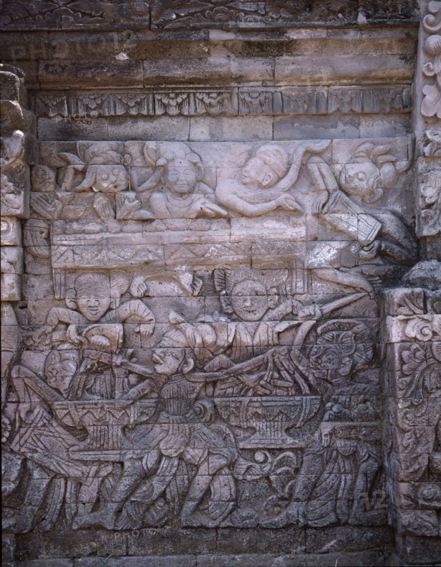 Stone relief on a temple wall at Sangsit, Buleleng