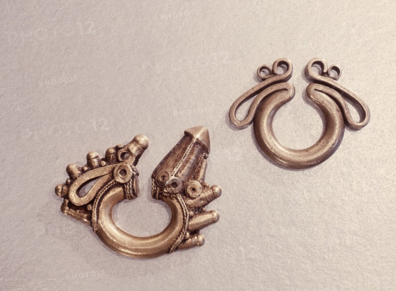 Lost wax cast brass earrings, probably presented to a bride by the grooms family as part of ceremonial gift exchange at weddings