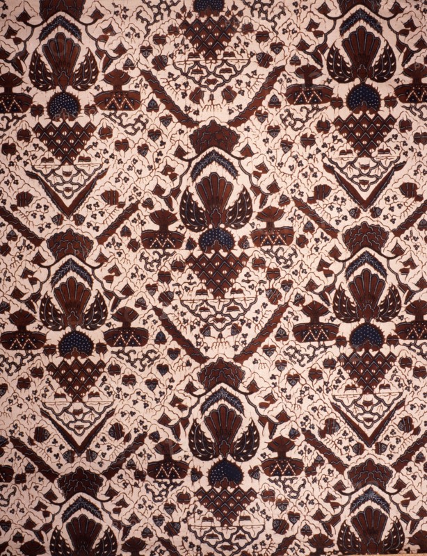 Detail of a batik kain with a design including wings, shrines and sacred mountains