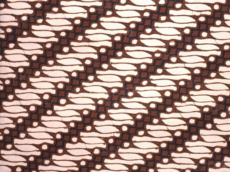 Detail of a batik kain with a variant of the scrolled parang motif once restricted to royal use