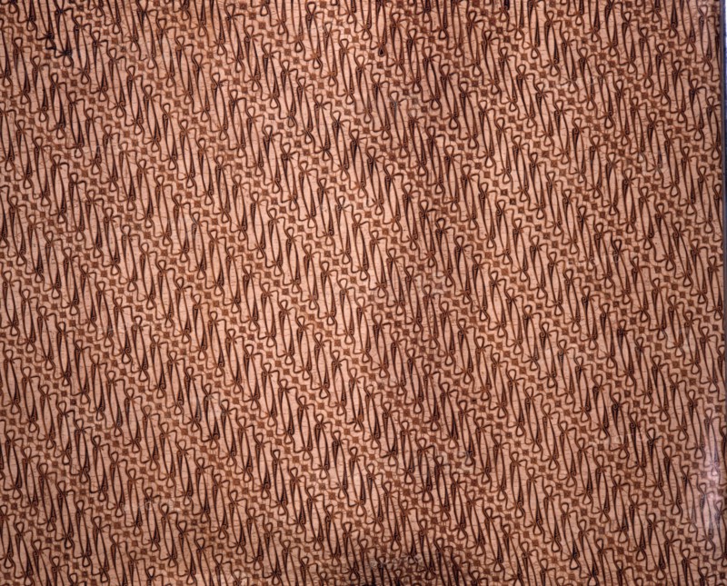 A batik kain with a variant of the scrolled parang motif once restricted to royal use