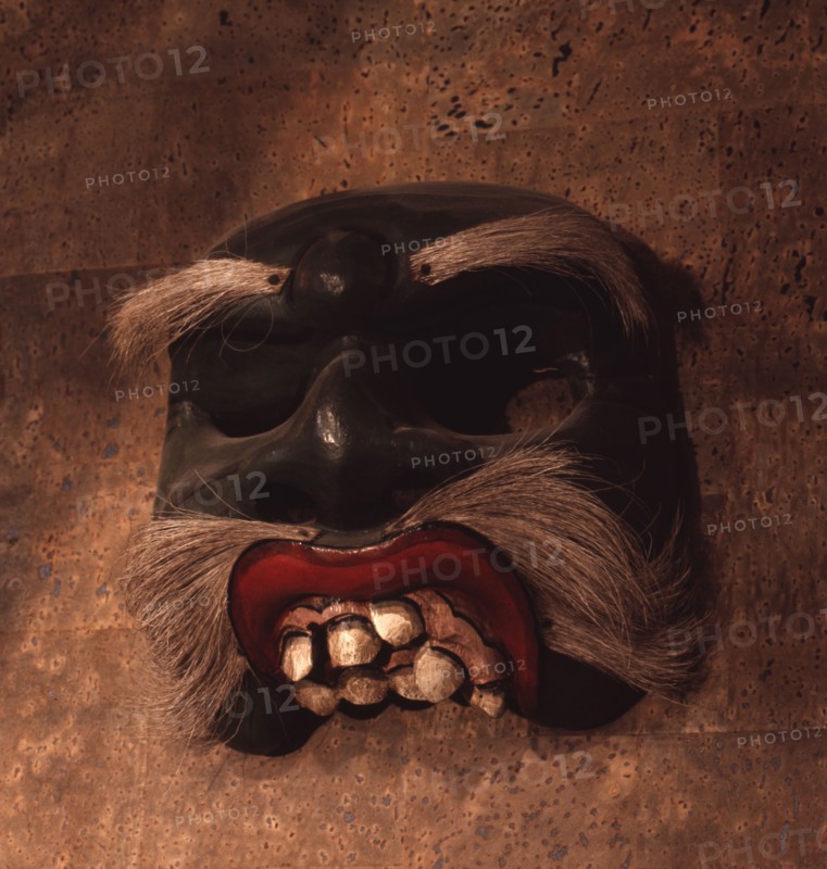 A mask, representing a diseased or deformed person, used in wayang wong performances of the Hindu epics, especially the Ramayana