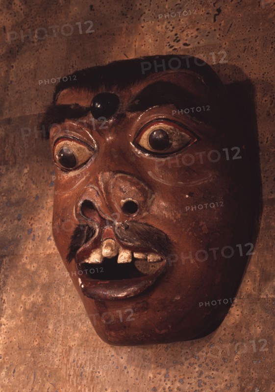 A mask, representing a diseased or deformed person, used in wayang wong performances of the Hindu epics, especially the Ramayana