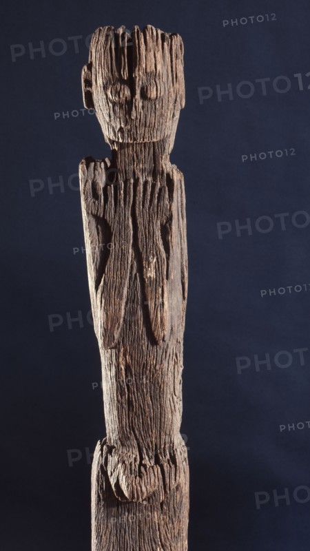 This figurative carving may be a bogy, serving as a site for a village guardian spirit, deterring strangers and enemies