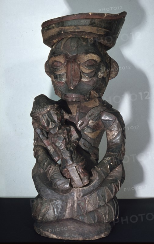 Carved and painted figure of the river goddess Balam, who rescues the wandering souls of sick people and returns them to their bodies