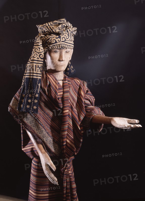 Regarded as a portrait of the deceased, a tau tau figure was dressed in his or her clothes and stood guard over the body on a balcony of the tomb cut into the cliff face