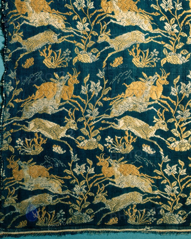 A compound silk cloth with a design of running deer and flowers