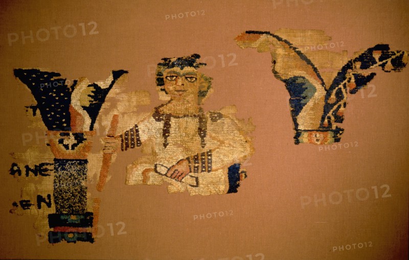 Textile fragment with man holding a scroll