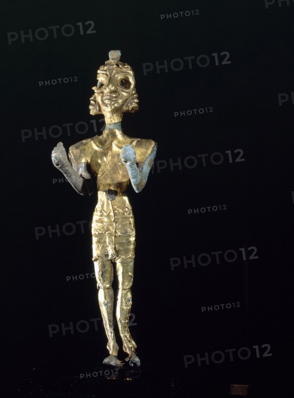 Canaanite gold and silver foil covered bronze figure of Baal