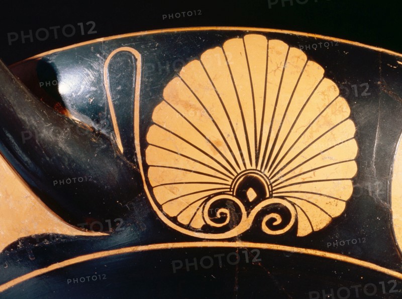 Attic bilingual eye cup, with black figure interior depicting running minotaur and inscription reading the boy is beautiful