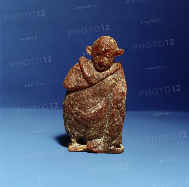 An amber statuette of an actor