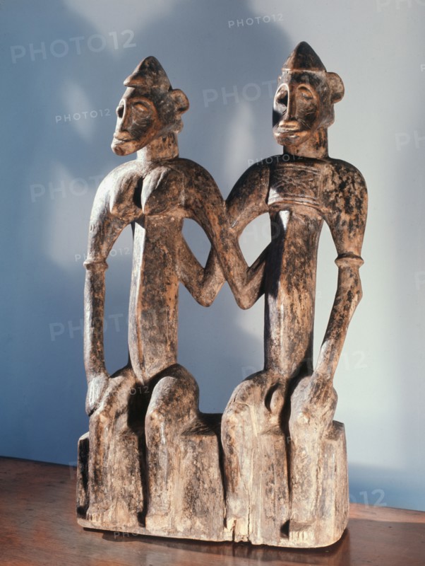 An unusual single carving depicting a primordial couple, founders of a Senufo lineage