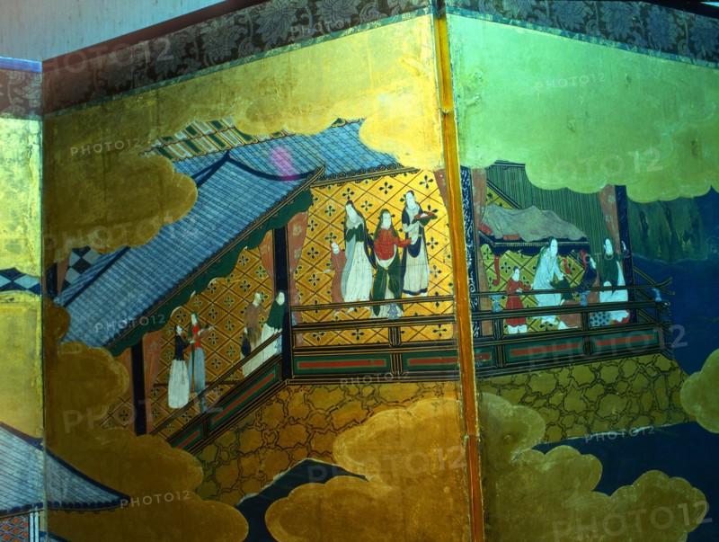 Detail from a folding namban jin or southern barbarian screen depicting a harbour scene recording the arrival of exotic looking Portuguese merchants in Japan