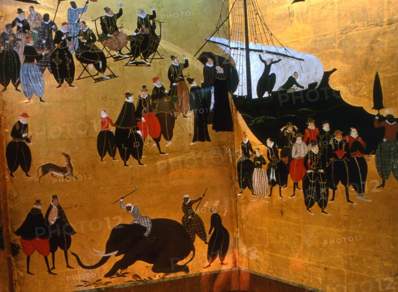 Detail from a folding namban jin or southern barbarian screen depicting a harbour scene recording the arrival of exotic looking Portuguese merchants in Japan