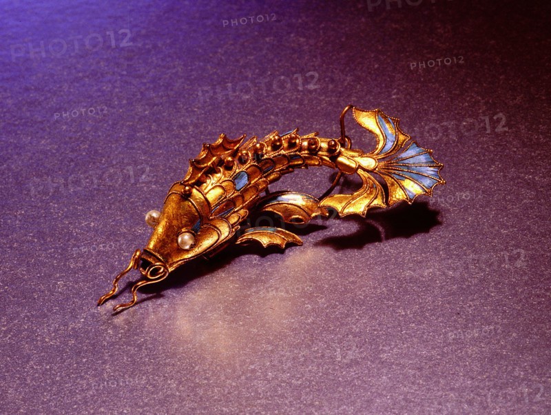 Silver gilt fish mounted on a hairpin