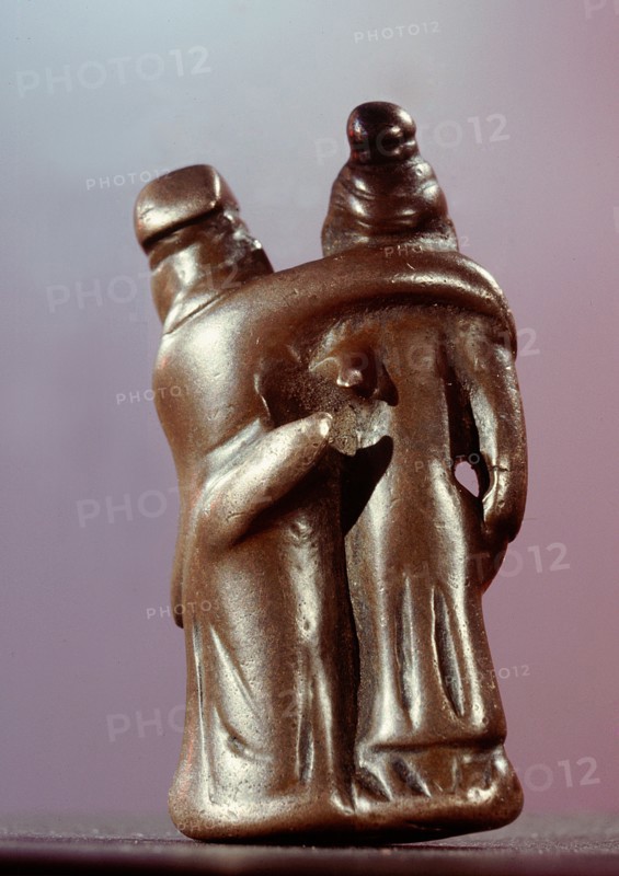 Pendant in the form of embracing lovers, or of lady supporting her inebriated partner