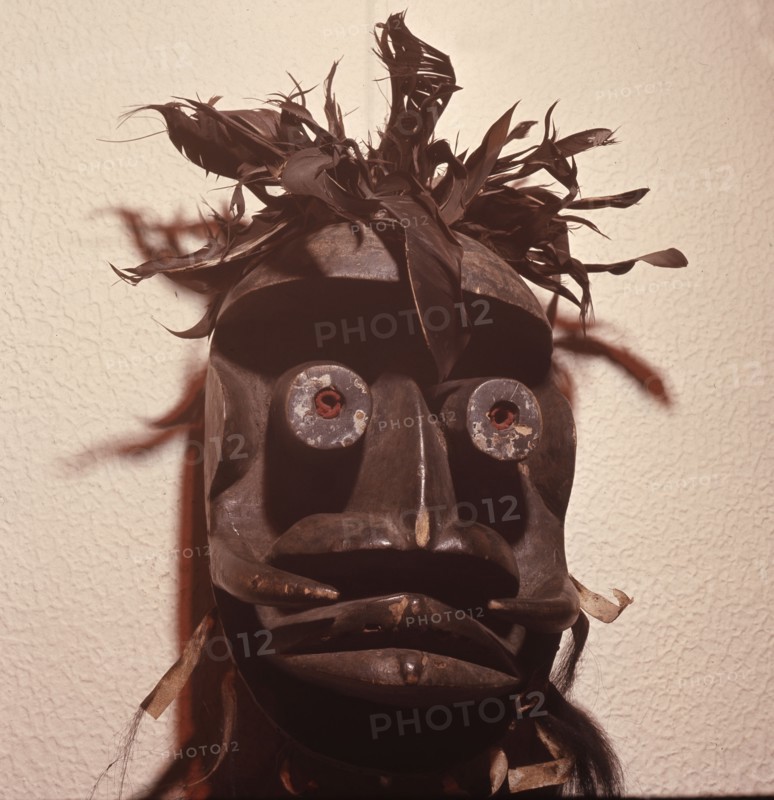 A mask of the kagle type, depicting a chimpanzee, used in performances that provoke the audience with wild dancing and outrageous behaviour