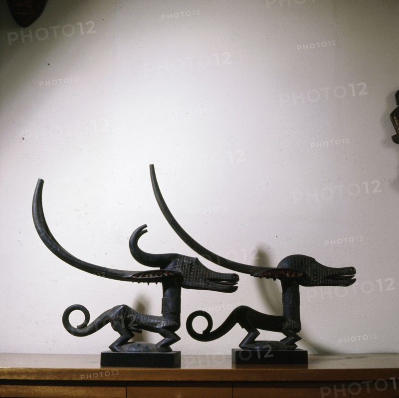 Chi Wara, depict a mythical hero combining aspects of man and antelope who taught men to till the fields