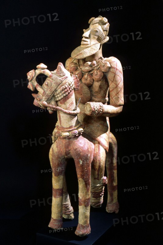 A terracotta horse mounted figure excavated from a tumulus in the Djenne/Mopti area