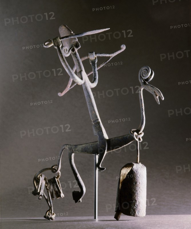 An altar iron in the form of a stylized horse and rider carrying a bow and arrow