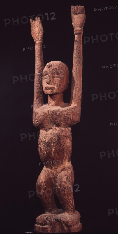 A nommo figure with upraised arms