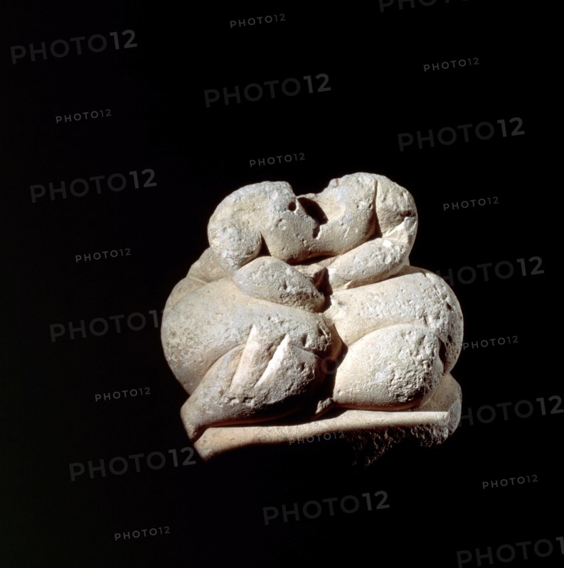 Fat Lady figurine, one of the 30 seated or squating figurines which comprise the Hagar Qim Group